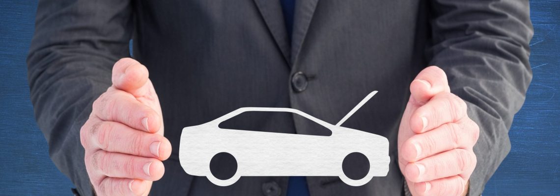 Digital composite image of businessman pretending to hold vector car sign